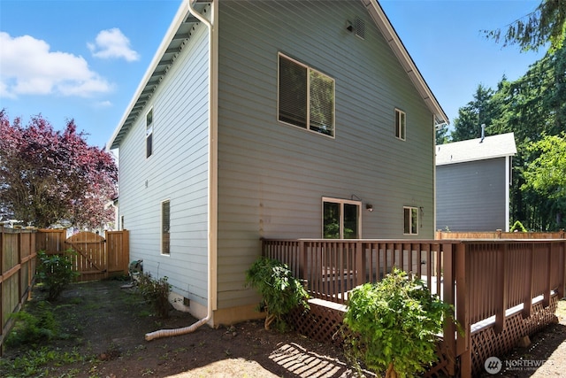 12904 159th St E, Puyallup, WA 98374 - rear view of property with a gate and a wooden deck