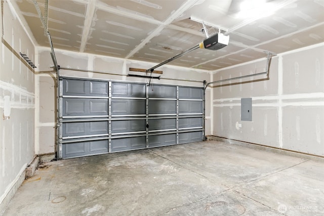 12904 159th St E, Puyallup, WA 98374 - garage featuring a garage door opener and electric panel
