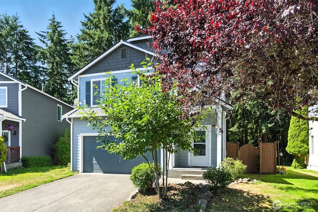12904 159th St E, Puyallup, WA 98374 - view of front of house with concrete driveway and a garage