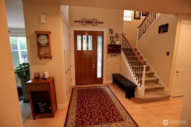 4442 Prestwick Ln SE, Lacey, WA 98513 - foyer entrance with light wood-style flooring and stairway