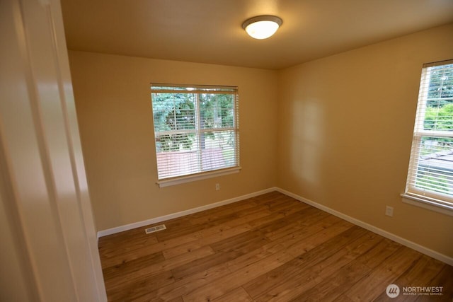 4442 Prestwick Ln SE, Lacey, WA 98513 - empty room with wood finished floors