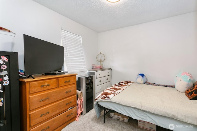 617-619 140th St S, Tacoma, WA 98444 - bedroom with light colored carpet, refrigerator, and a textured ceiling