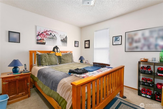 617-619 140th St S, Tacoma, WA 98444 - carpeted bedroom with a textured ceiling and baseboards