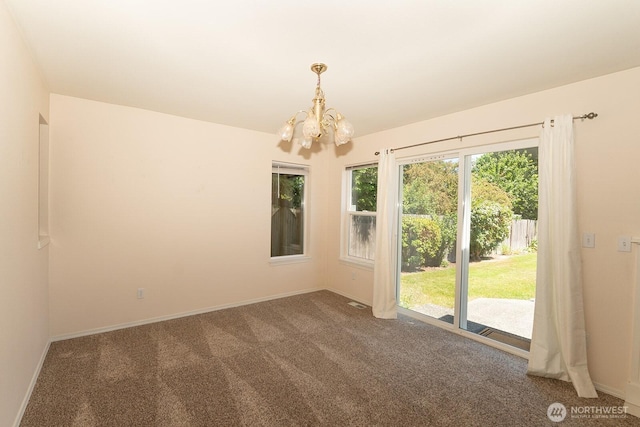 527 Cypress Ave, Snohomish, WA 98290 - carpeted spare room with a chandelier and baseboards