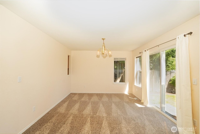 527 Cypress Ave, Snohomish, WA 98290 - empty room featuring a chandelier and light colored carpet