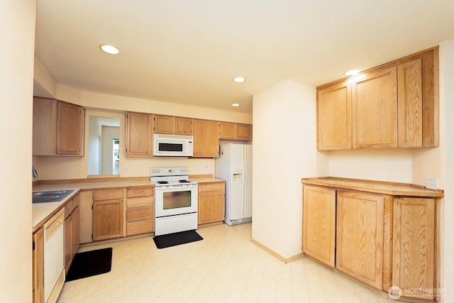 527 Cypress Ave, Snohomish, WA 98290 - kitchen featuring white appliances, light floors, recessed lighting, and light countertops
