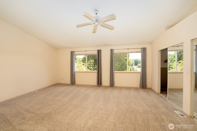 527 Cypress Ave, Snohomish, WA 98290 - unfurnished room with plenty of natural light, light colored carpet, a ceiling fan, and lofted ceiling