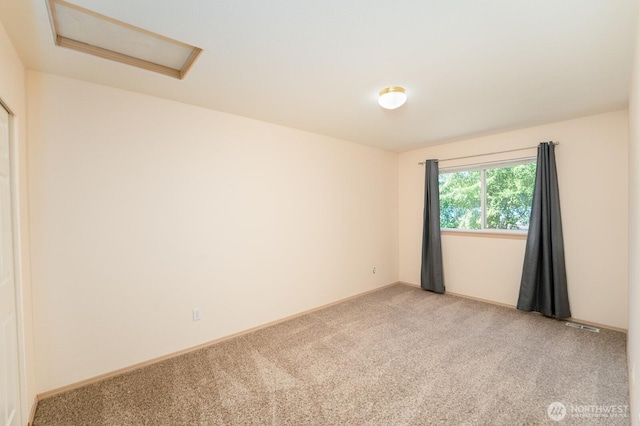 527 Cypress Ave, Snohomish, WA 98290 - empty room with attic access and light carpet