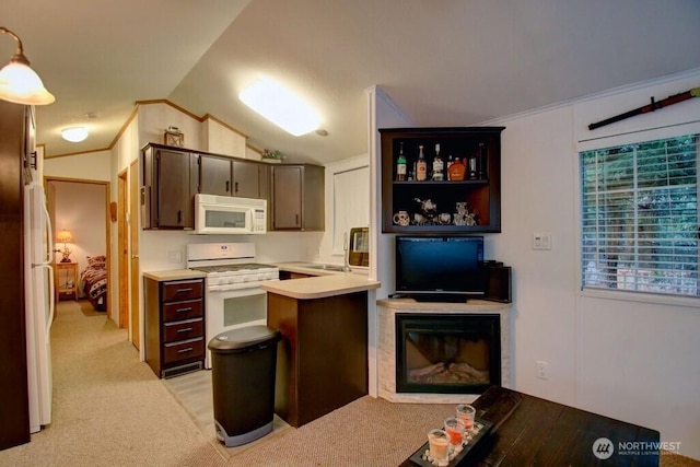 35 Branch Cir, Deming, WA 98244 - kitchen featuring white appliances, light countertops, a peninsula, lofted ceiling, and light colored carpet