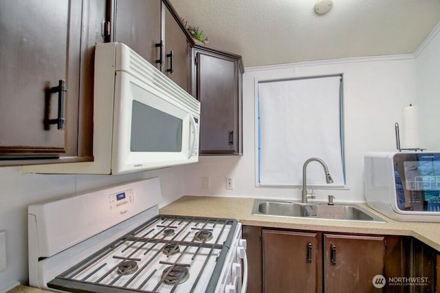 35 Branch Cir, Deming, WA 98244 - kitchen with white appliances, dark brown cabinets, light countertops, and a textured ceiling