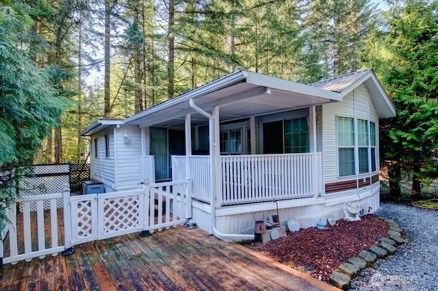 35 Branch Cir, Deming, WA 98244 - manufactured / mobile home featuring a porch, a metal roof, and a deck