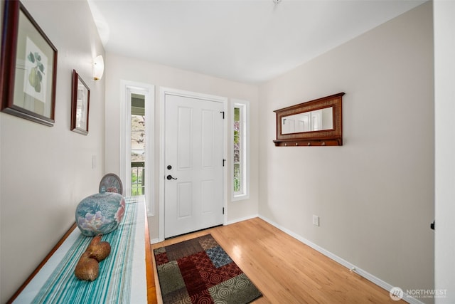 591 Daniels Dr NE, East Wenatchee, WA 98802 - entryway featuring wood finished floors and baseboards