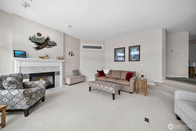591 Daniels Dr NE, East Wenatchee, WA 98802 - carpeted living area featuring a premium fireplace and baseboards