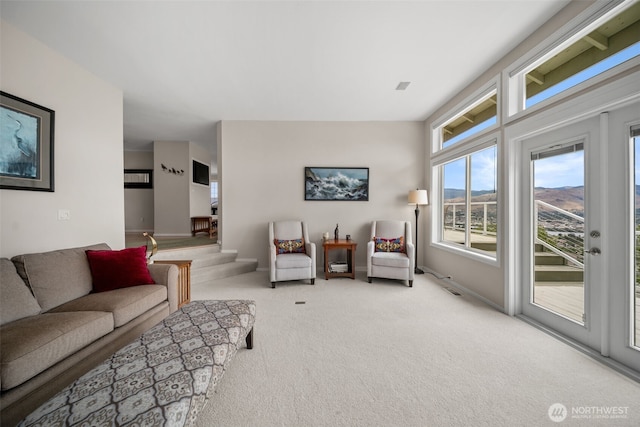 591 Daniels Dr NE, East Wenatchee, WA 98802 - carpeted living room with baseboards