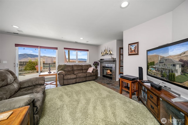 591 Daniels Dr NE, East Wenatchee, WA 98802 - living room with a tiled fireplace and recessed lighting