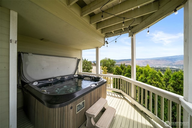 591 Daniels Dr NE, East Wenatchee, WA 98802 - wooden deck with a hot tub and a mountain view