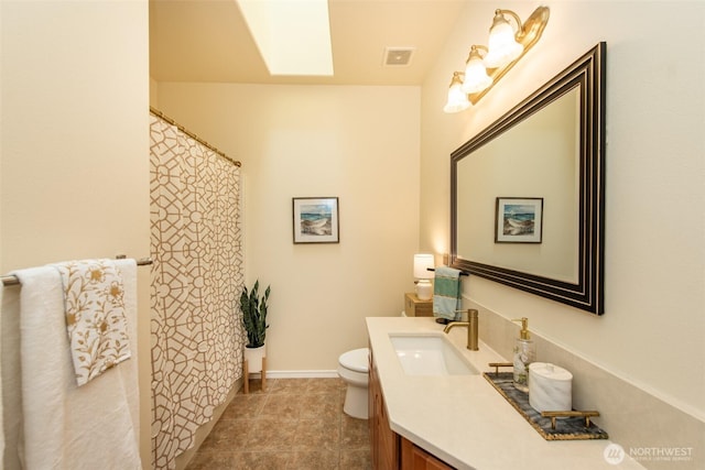 120 Cascadia Loop, Sequim, WA 98382 - full bathroom with vanity, a skylight, and a shower with curtain