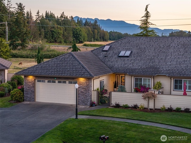 120 Cascadia Loop, Sequim, WA 98382 - view of front of property with driveway, a mountain view, a garage, and a gate
