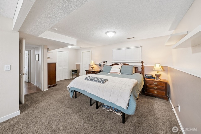 4610 N Defiance St, Tacoma, WA 98407 - bedroom with a textured ceiling, carpet, and a closet