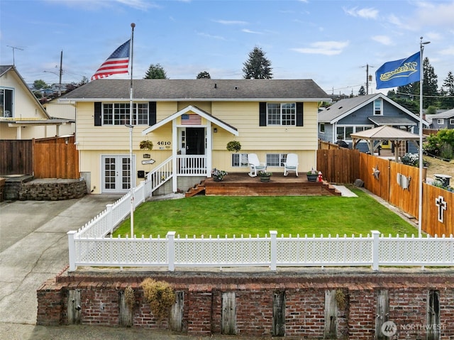 4610 N Defiance St, Tacoma, WA 98407 - view of front of home with a fenced backyard and french doors