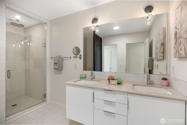 140 26th Ave E, Seattle, WA 98112 - full bathroom with a stall shower, double vanity, and tile patterned floors