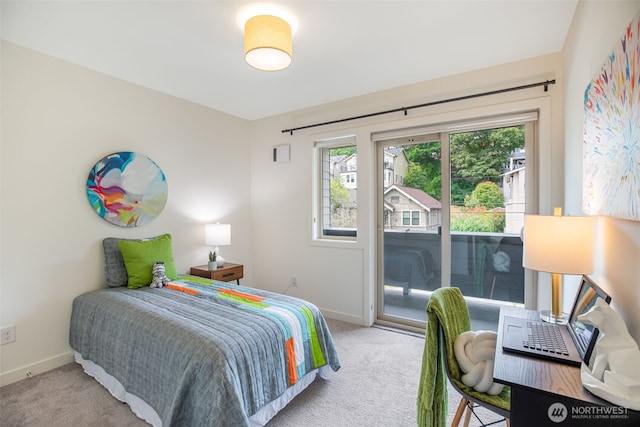 140 26th Ave E, Seattle, WA 98112 - bedroom with light colored carpet and access to outside