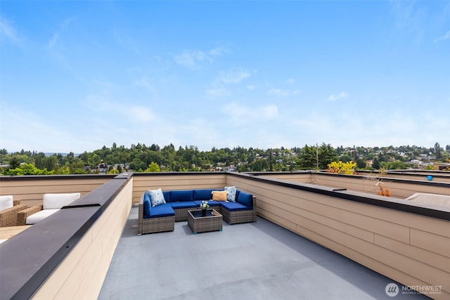 140 26th Ave E, Seattle, WA 98112 - patio / terrace with outdoor lounge area and view of wooded area