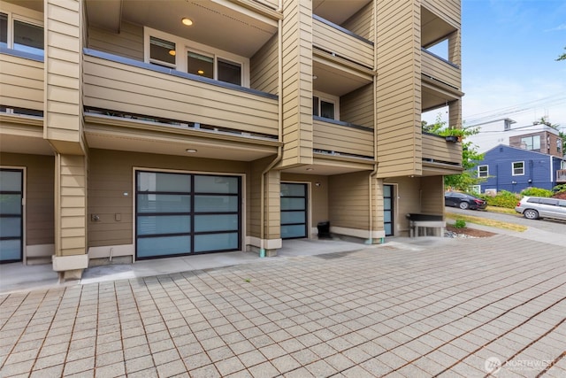 140 26th Ave E, Seattle, WA 98112 - view of building exterior featuring an attached garage