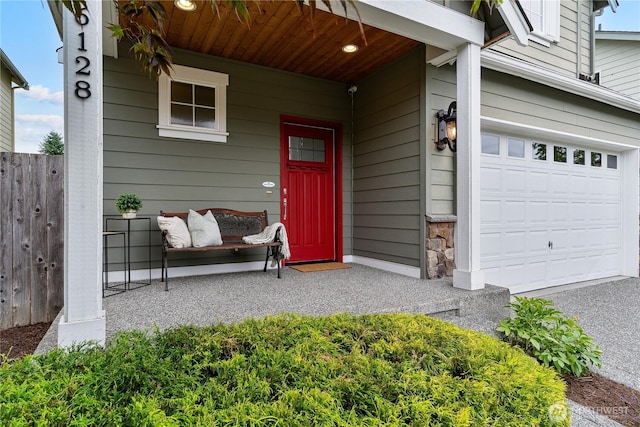 16128 120th Ave NE, Bothell, WA 98011 - doorway to property with covered porch, driveway, and an attached garage