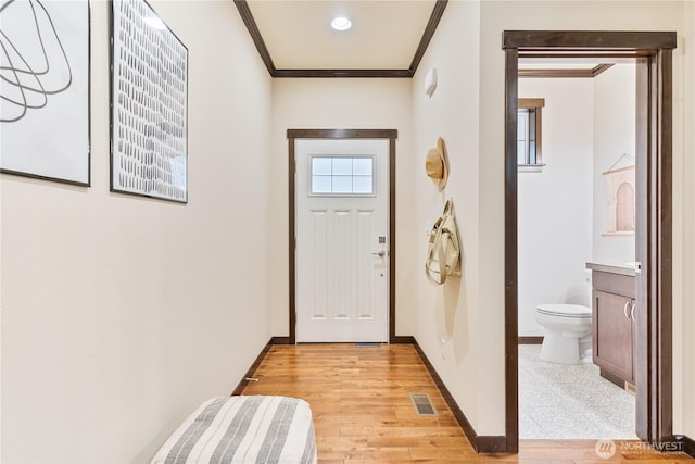 16128 120th Ave NE, Bothell, WA 98011 - foyer entrance with ornamental molding and light wood-style floors