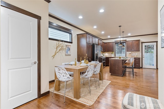 16128 120th Ave NE, Bothell, WA 98011 - dining space with recessed lighting, light wood-style flooring, and crown molding