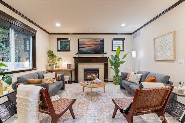 16128 120th Ave NE, Bothell, WA 98011 - living room with crown molding, a fireplace, plenty of natural light, and recessed lighting