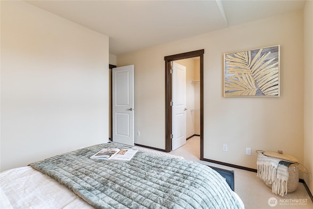 16128 120th Ave NE, Bothell, WA 98011 - bedroom with light colored carpet and a walk in closet