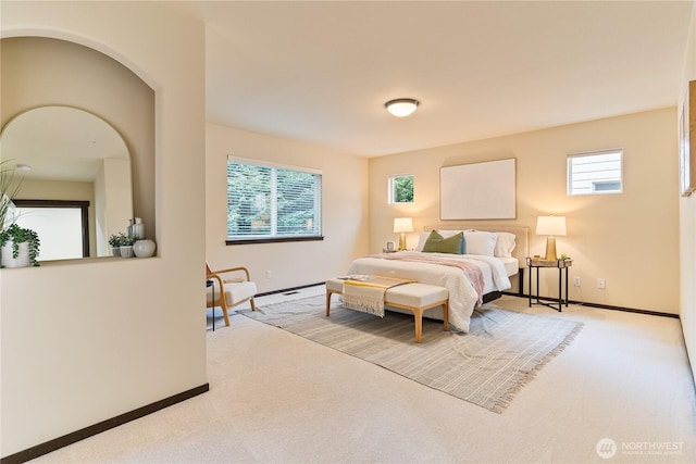 16128 120th Ave NE, Bothell, WA 98011 - carpeted bedroom featuring multiple windows