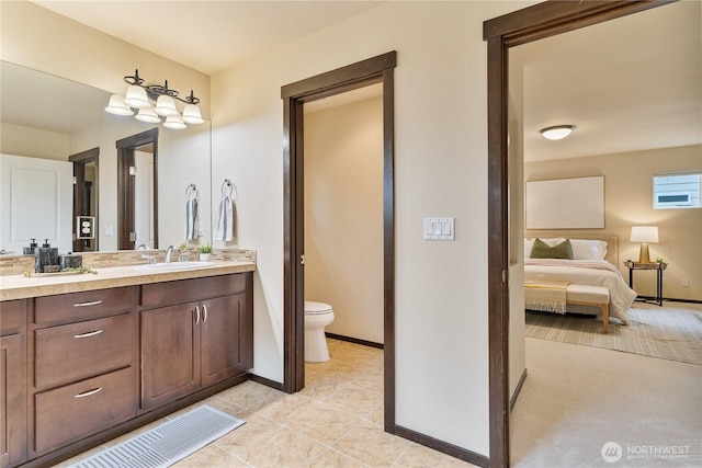 16128 120th Ave NE, Bothell, WA 98011 - ensuite bathroom featuring vanity and tile patterned flooring