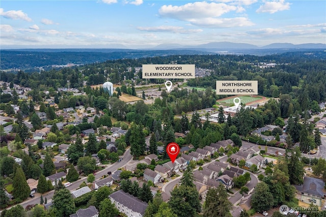 16128 120th Ave NE, Bothell, WA 98011 - aerial view of a mountainous background and a heavily wooded area
