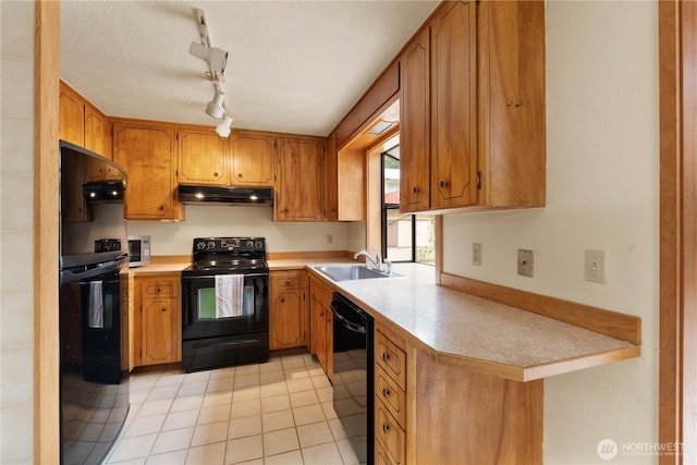31312 179th Pl SE, Auburn, WA 98092 - kitchen featuring black appliances, under cabinet range hood, light countertops, and light tile patterned floors