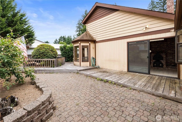 31312 179th Pl SE, Auburn, WA 98092 - back of property with a deck and a patio area