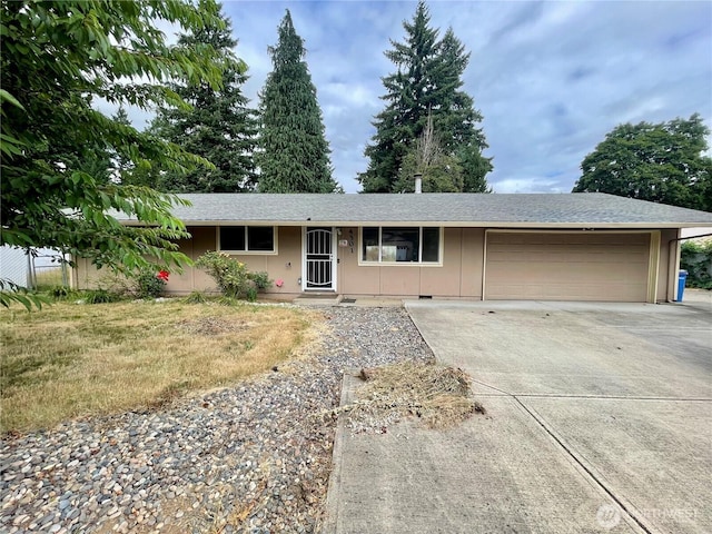 4301 NE 137th Ave, Vancouver, WA 98682 - ranch-style home with concrete driveway, an attached garage, and a shingled roof