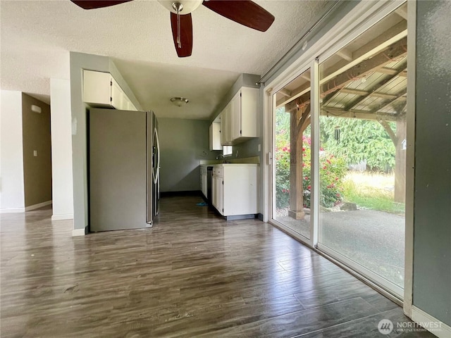4301 NE 137th Ave, Vancouver, WA 98682 - kitchen featuring stainless steel refrigerator with ice dispenser, white cabinets, ceiling fan, dark wood-type flooring, and a textured ceiling