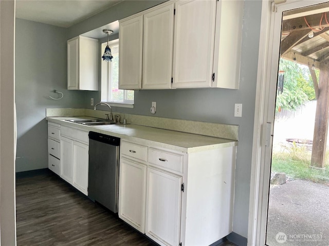 4301 NE 137th Ave, Vancouver, WA 98682 - kitchen featuring stainless steel dishwasher, white cabinetry, light countertops, dark wood-type flooring, and decorative light fixtures