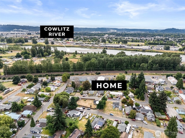 1428 S 4th Ave, Kelso, WA 98626 - aerial overview of property's location featuring a mountainous background