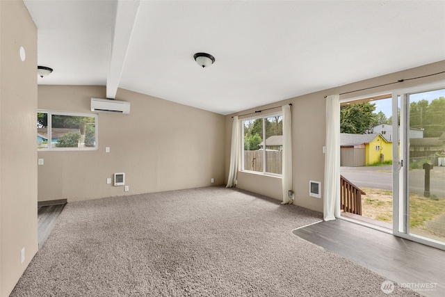 1428 S 4th Ave, Kelso, WA 98626 - spare room featuring a wall unit AC, carpet floors, and heating unit