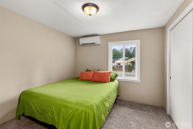1428 S 4th Ave, Kelso, WA 98626 - carpeted bedroom featuring a wall mounted air conditioner