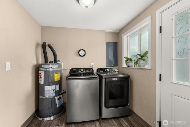 1428 S 4th Ave, Kelso, WA 98626 - laundry area featuring water heater, washer and dryer, dark wood-type flooring, and electric panel