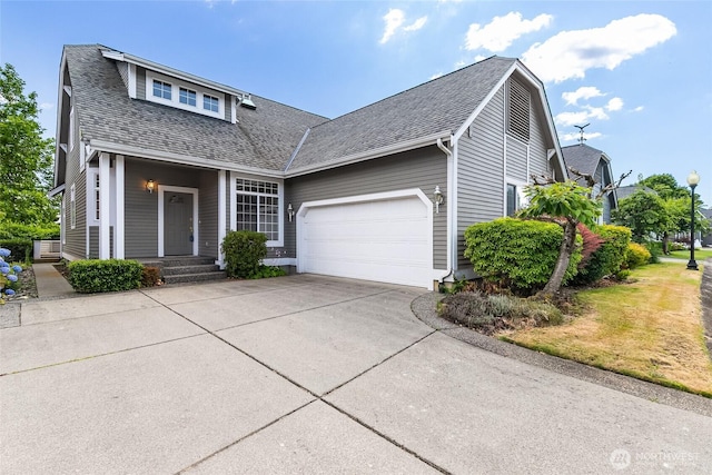 114 Twin Sister Loop, Lynden, WA 98264 - view of front facade featuring a shingled roof, a garage, and driveway