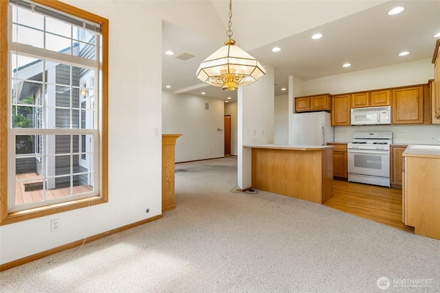 114 Twin Sister Loop, Lynden, WA 98264 - kitchen featuring white appliances, a chandelier, healthy amount of natural light, light colored carpet, and recessed lighting