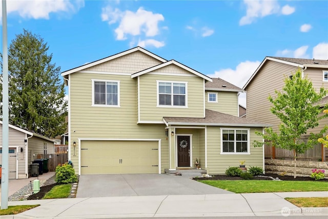 28515 76th Dr NW, Stanwood, WA 98292 - view of front of property with concrete driveway, a garage, and a shingled roof