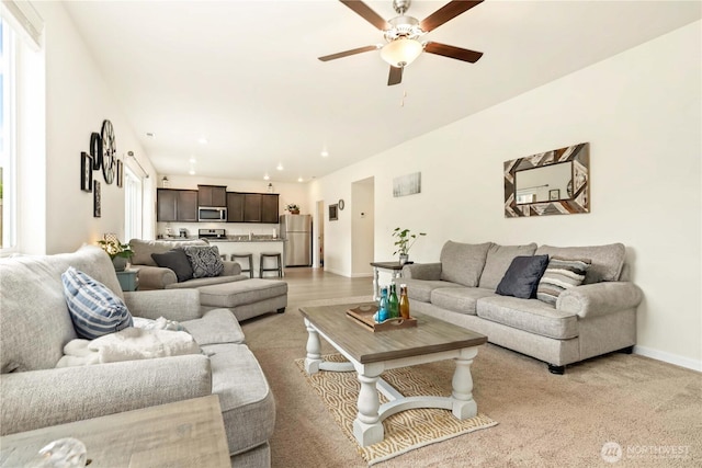 28515 76th Dr NW, Stanwood, WA 98292 - living room with a ceiling fan, light colored carpet, and recessed lighting