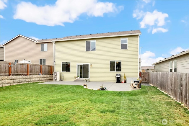 28515 76th Dr NW, Stanwood, WA 98292 - back of property with a patio area and a fenced backyard